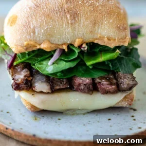 Ribeye Steak Sandwich with ciabatta bread.
