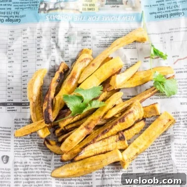 Fries on a newspaper.
