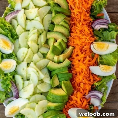 Lettuce, cucumbers and other vegetables on a platter