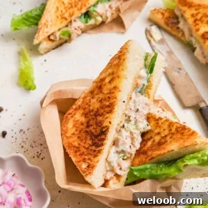 Chicken Mayonnaise Sandwiches cut into triangles.