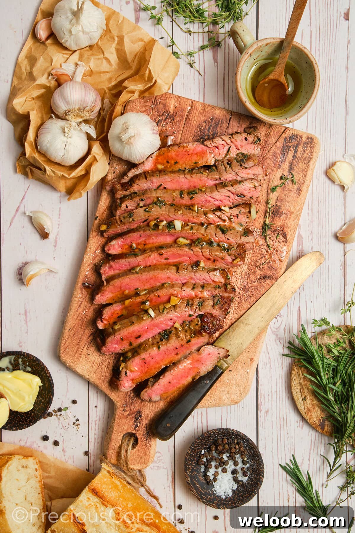 Cooked steak with other ingredients around.