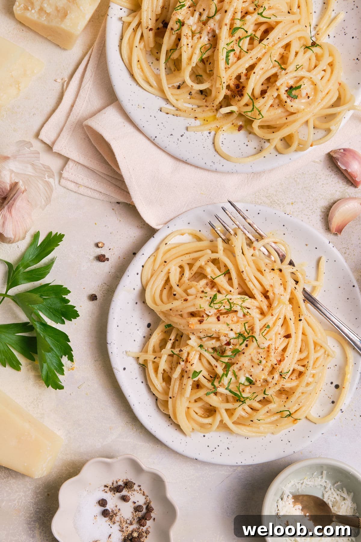 Lemony pasta served on a plate.