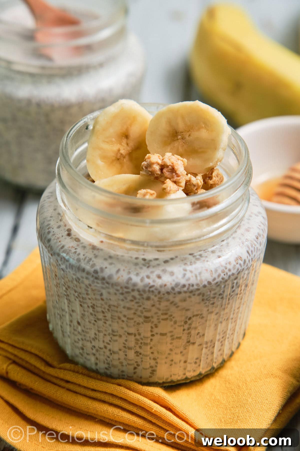Close-up of a jar of banana chia pudding.