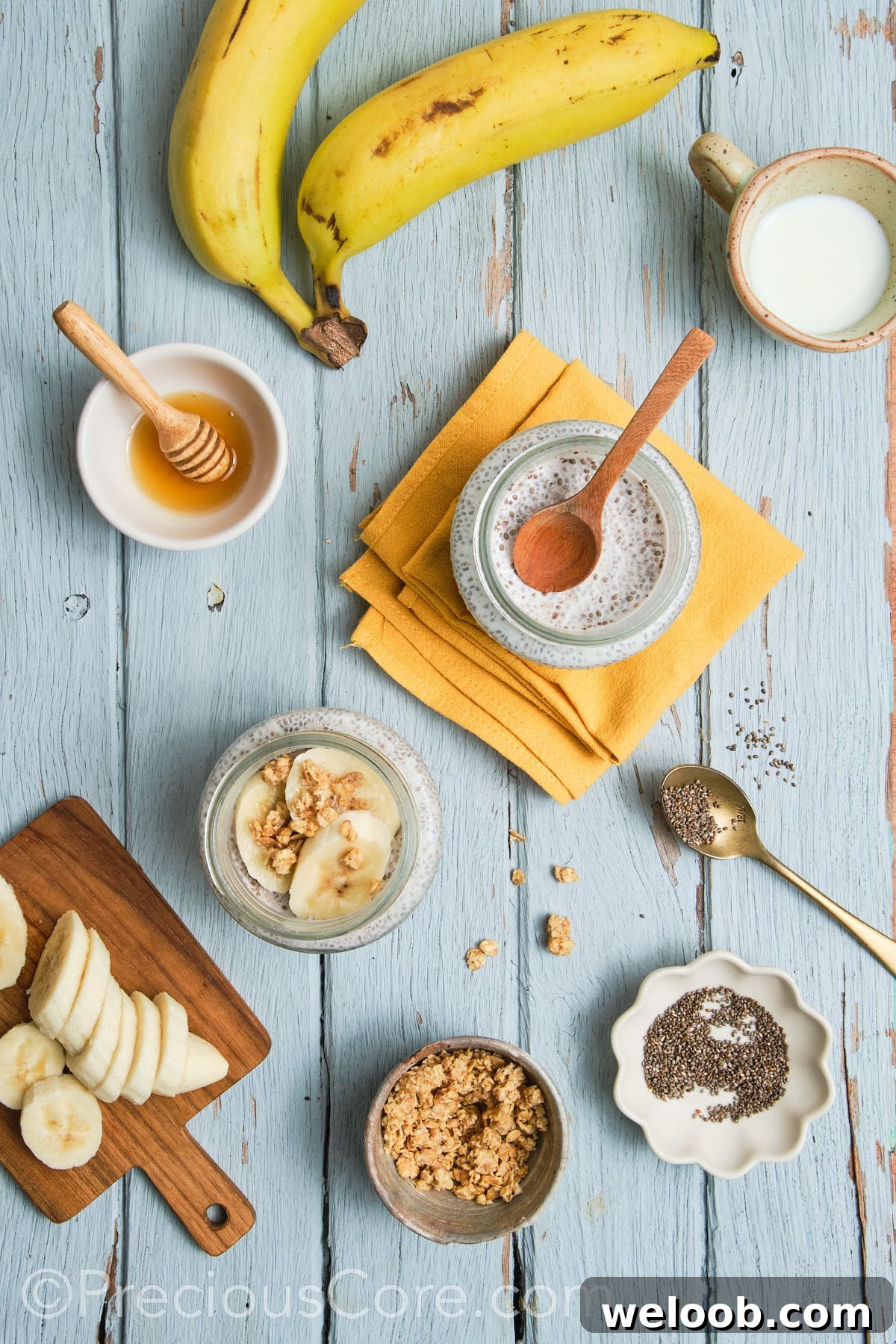 Banana chia seed pudding topped with banana slices and walnuts.