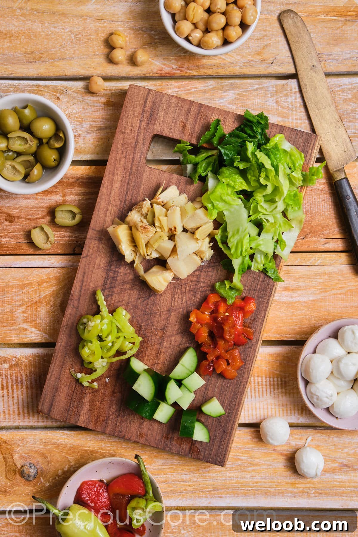 Diced vegetables on a chopping board.