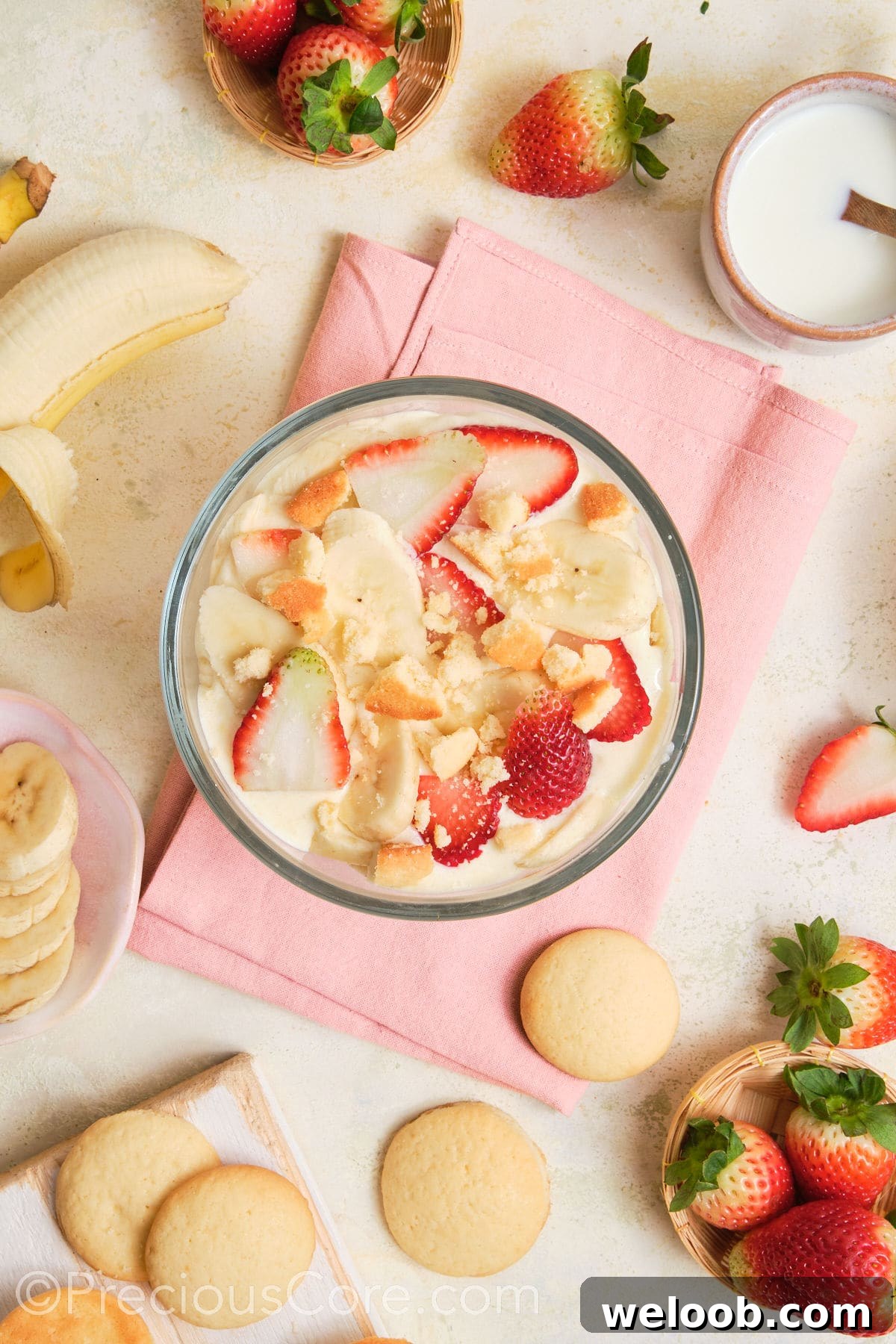 Crushed vanilla wafer cookies added to strawberry banana pudding.