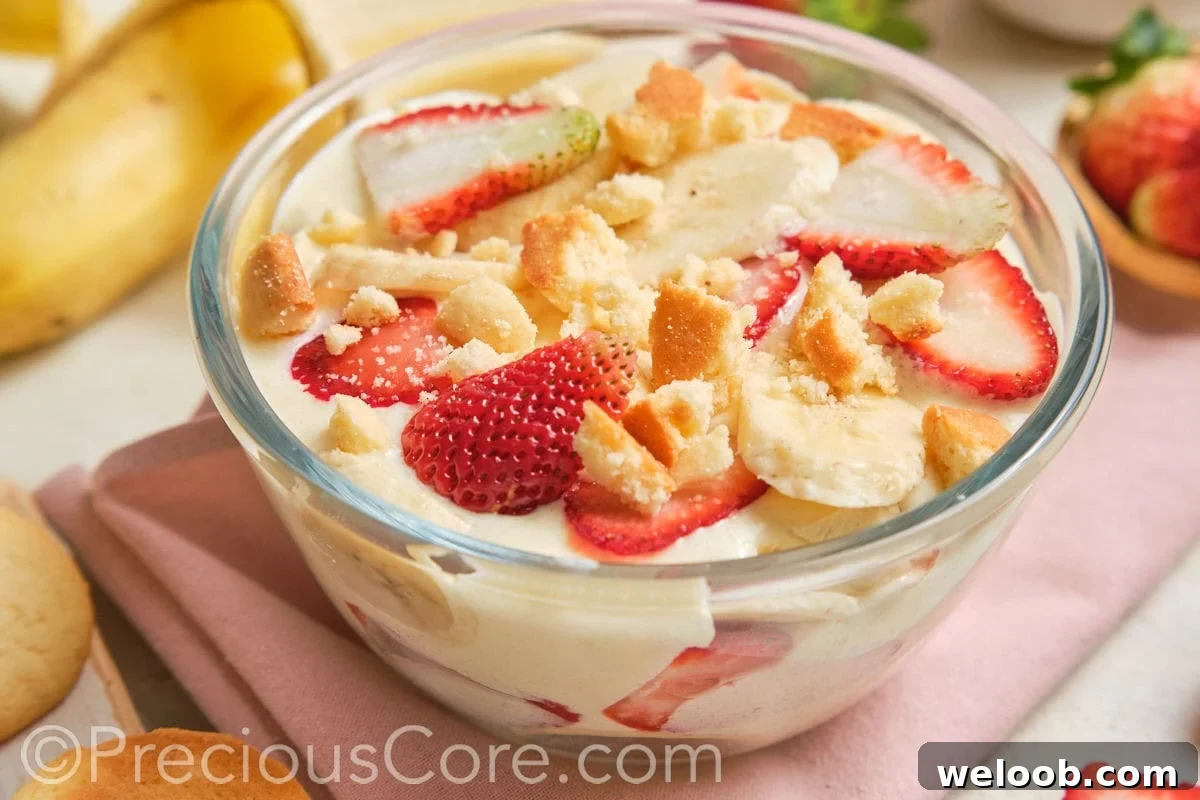 A glass bowl of homemade pudding dessert.