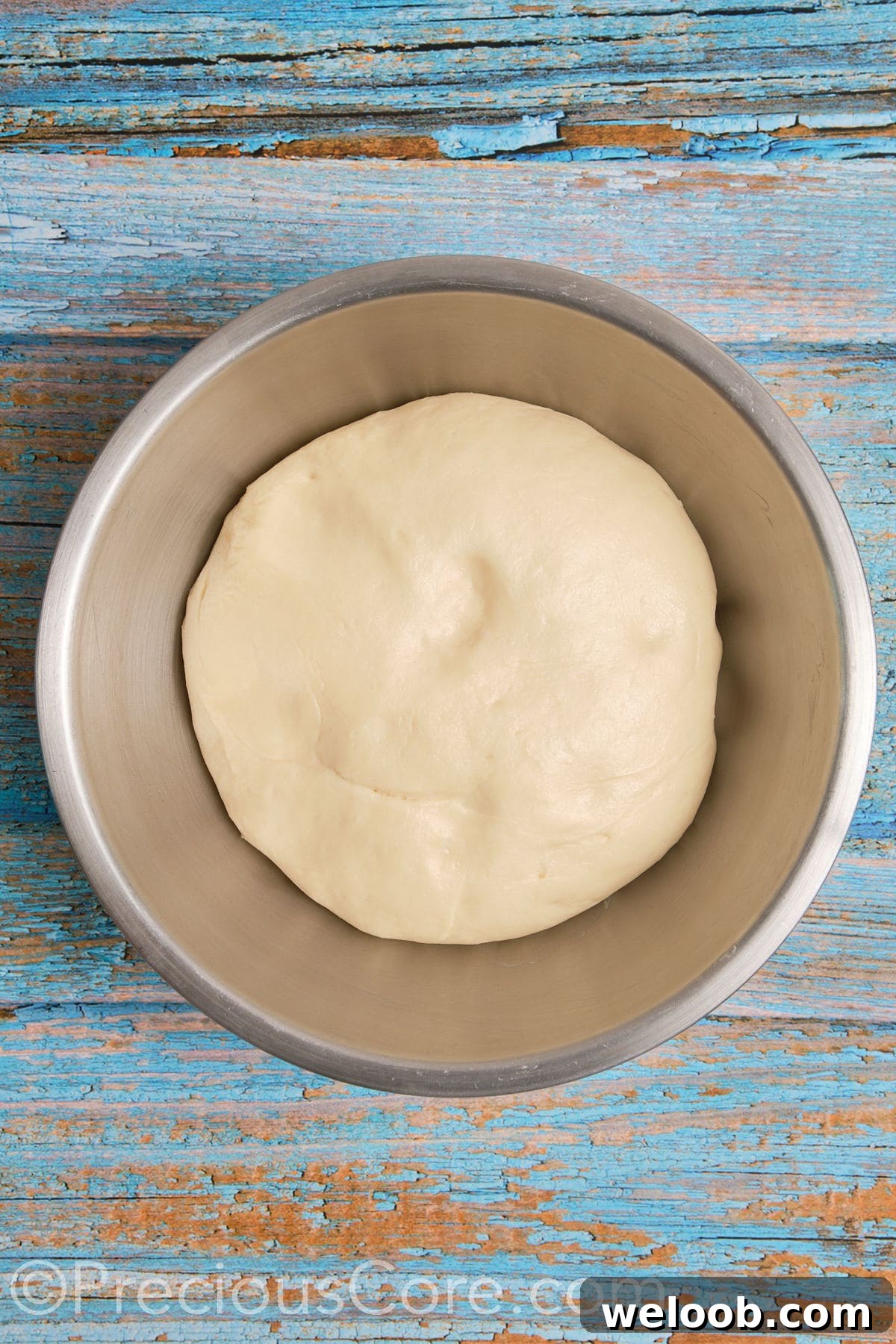 Risen homemade cinnamon rolls dough.
