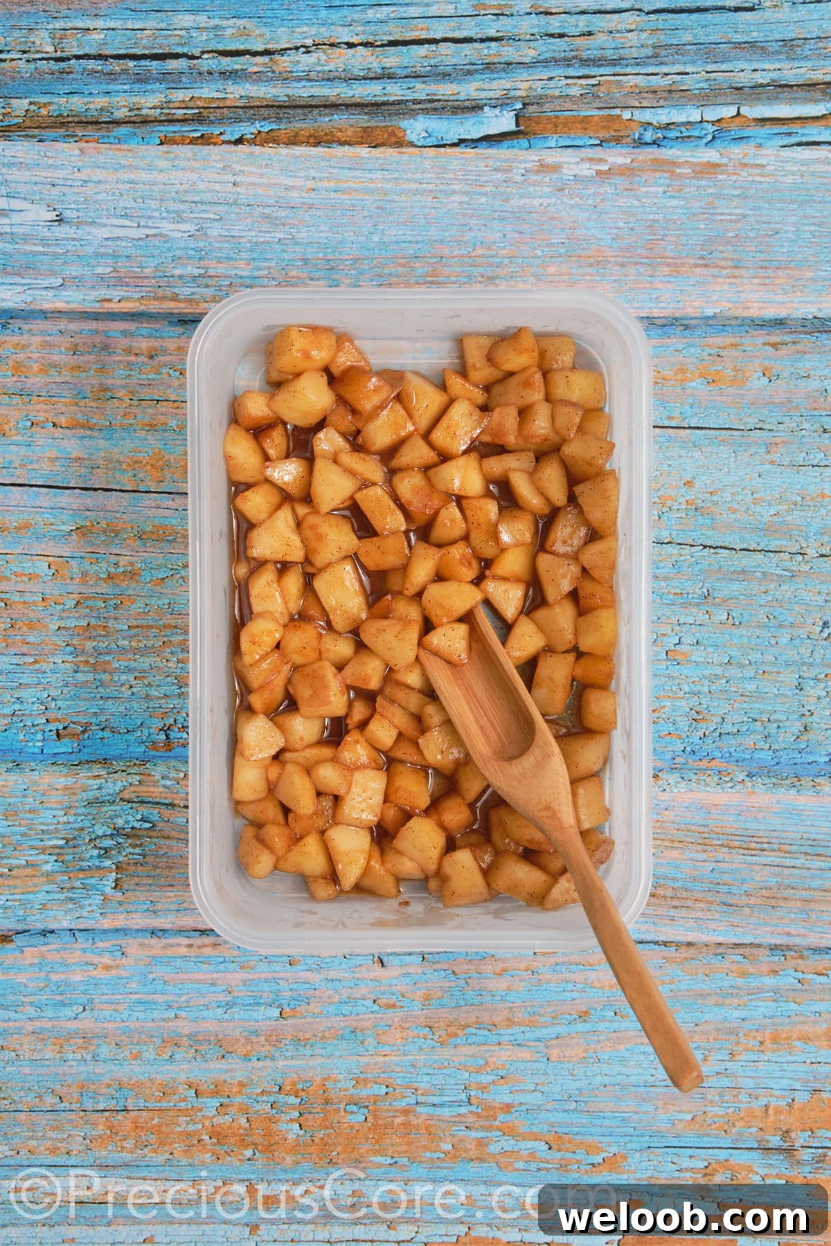Cooled apple pie filling in a bowl.