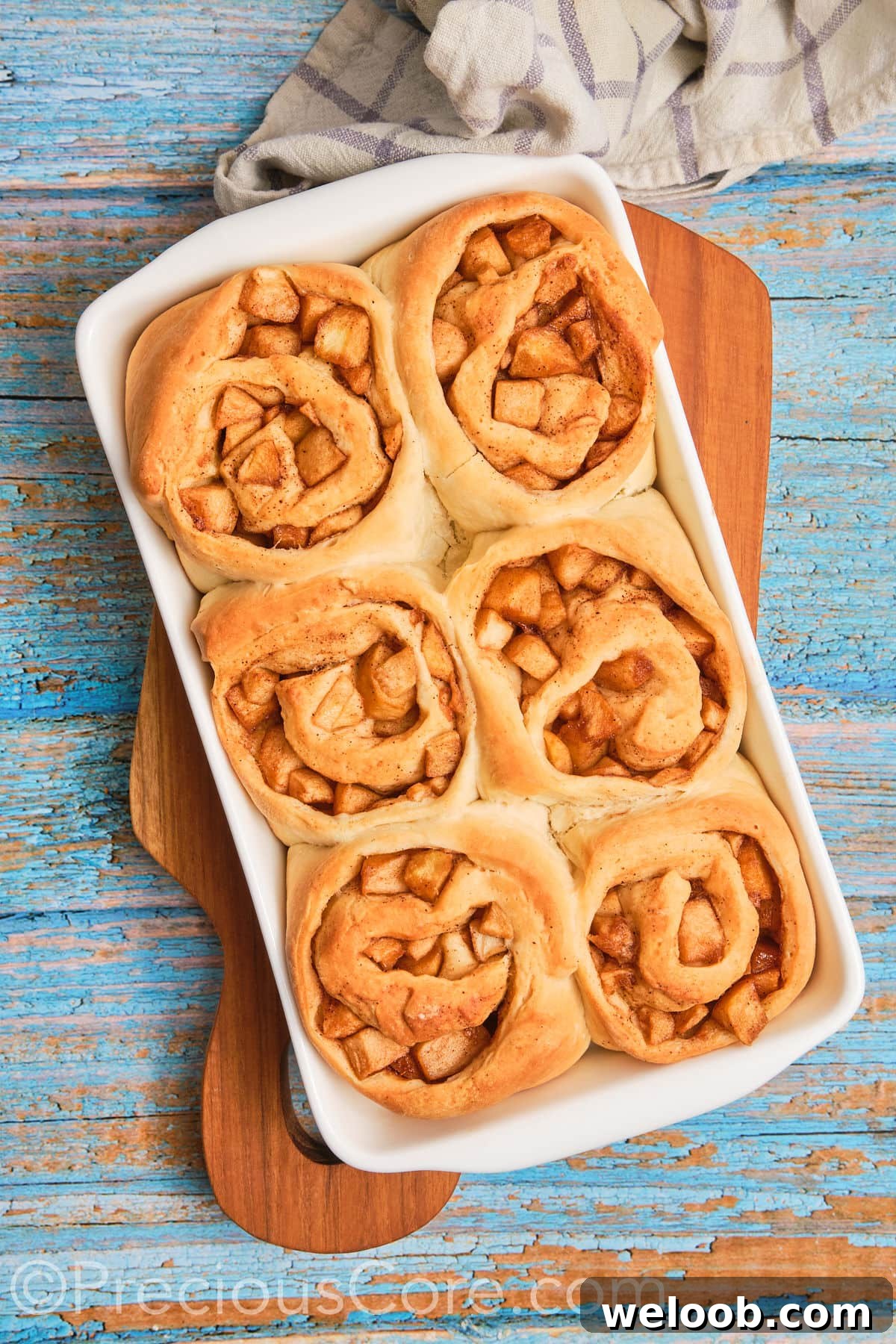 Baked Cinnamon Rolls With Apple Pie Filling.