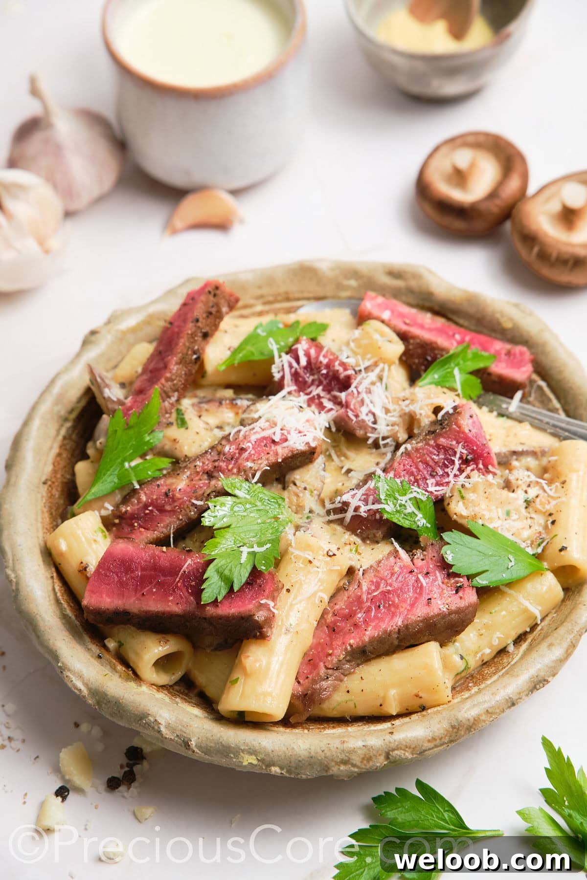Steak pasta in a bowl.