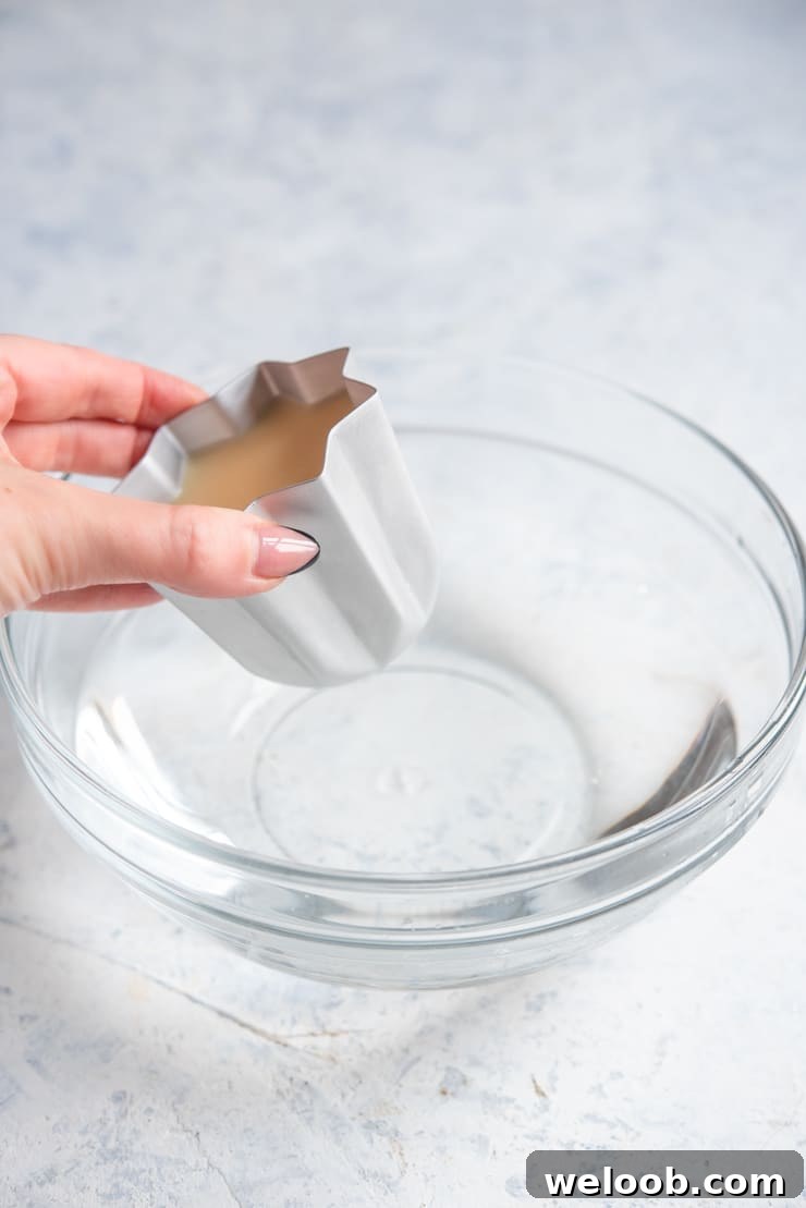 A photo showing how to remove panna cotta from moulds