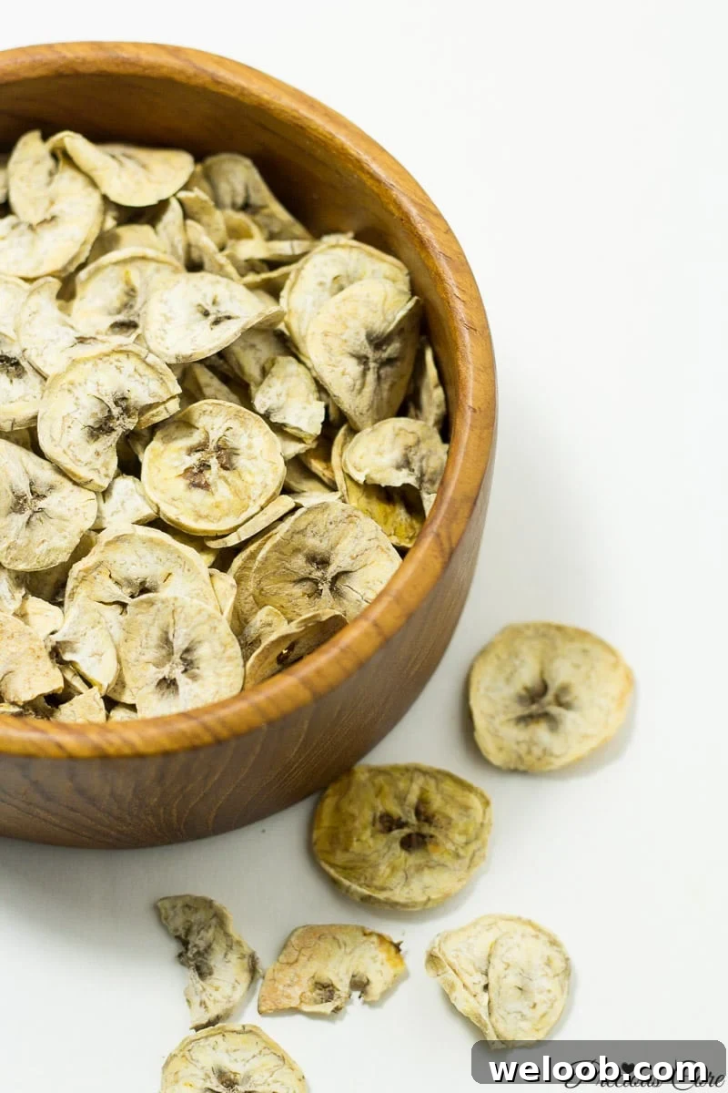 Wooden bowl of dried plantains.