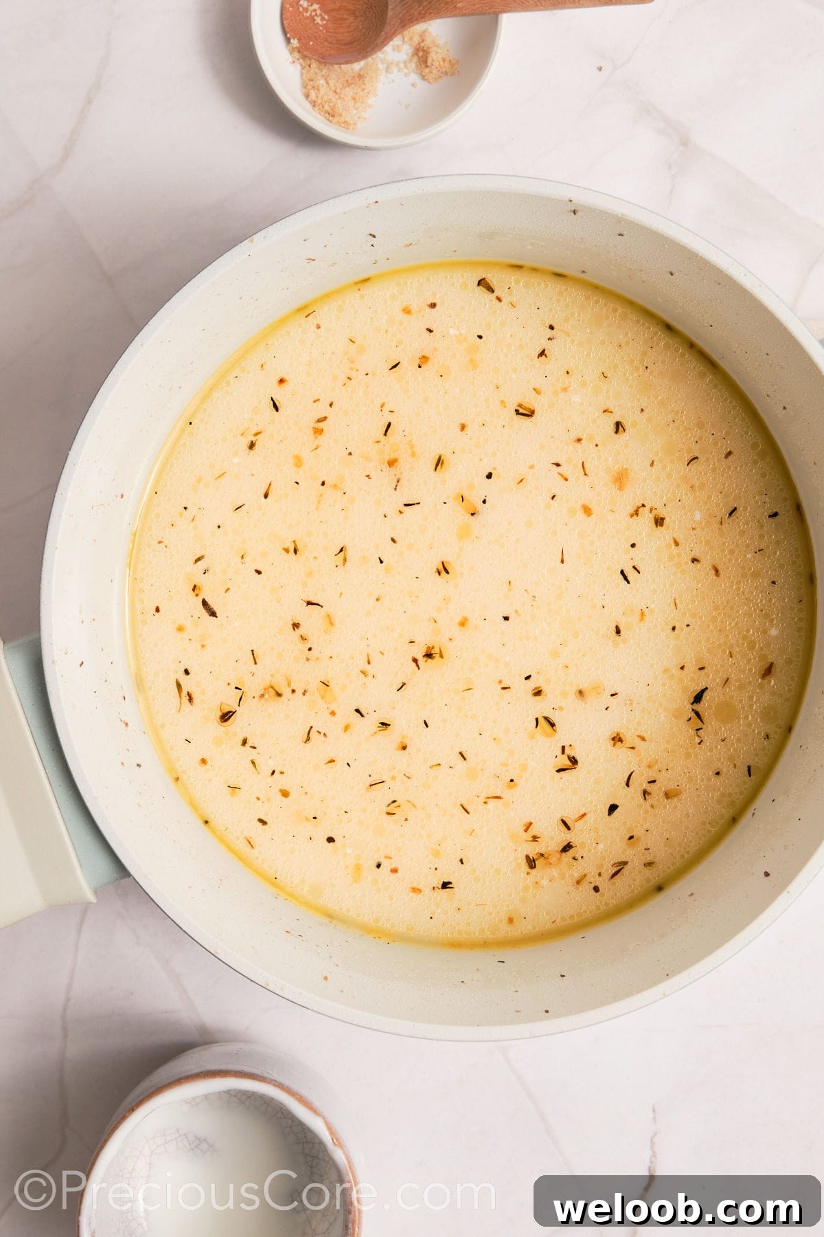 Water and cream added to pot.