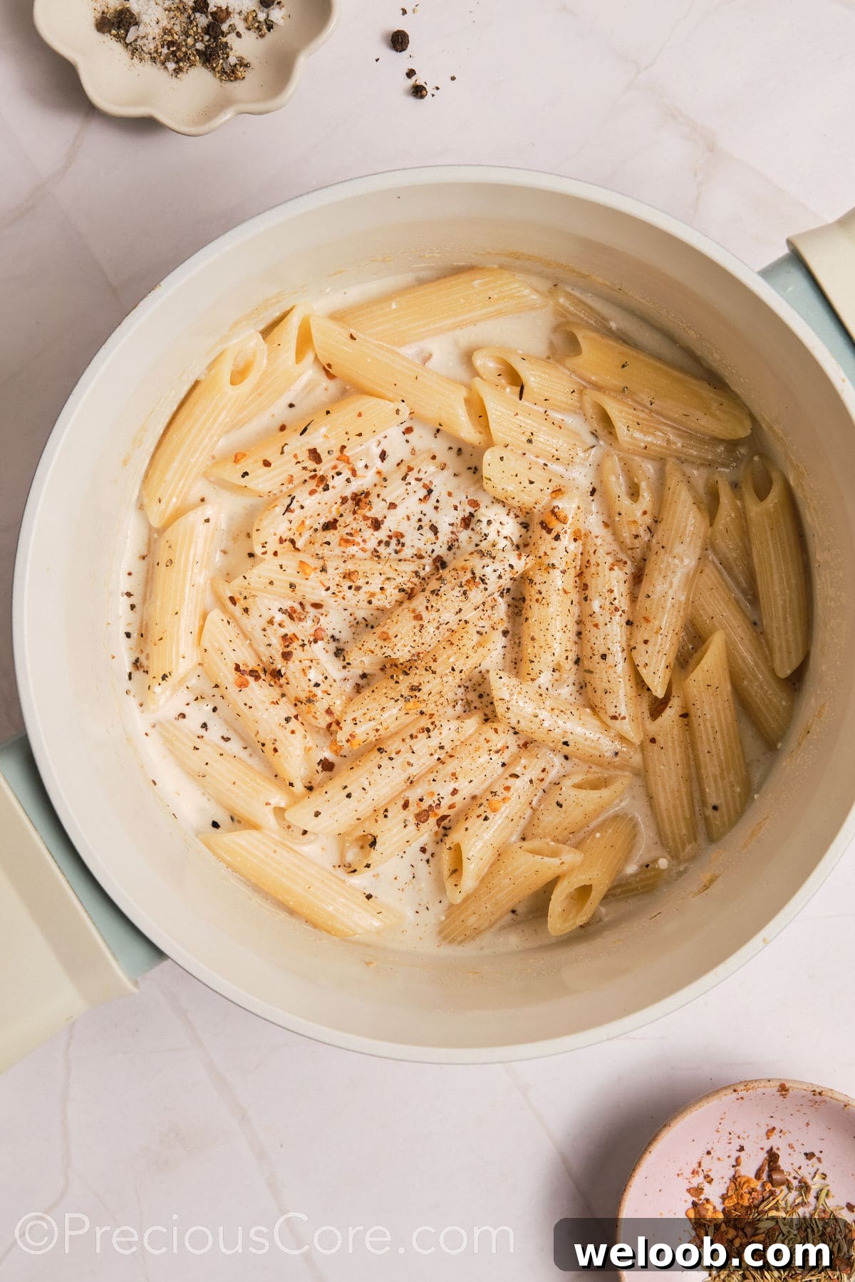 Seasoning added to one pot creamy pasta.