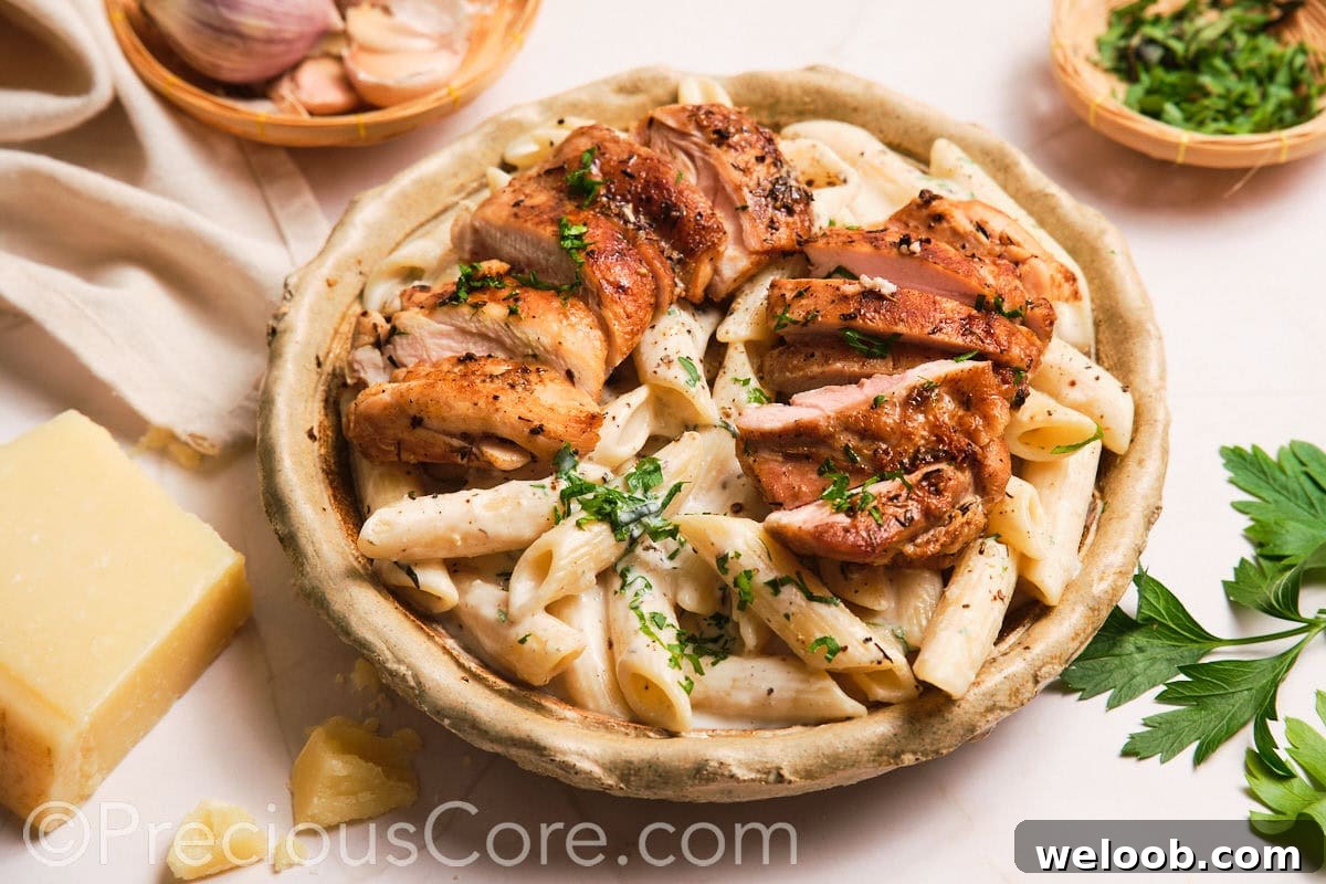 Landscape image of one pot creamy chicken pasta.