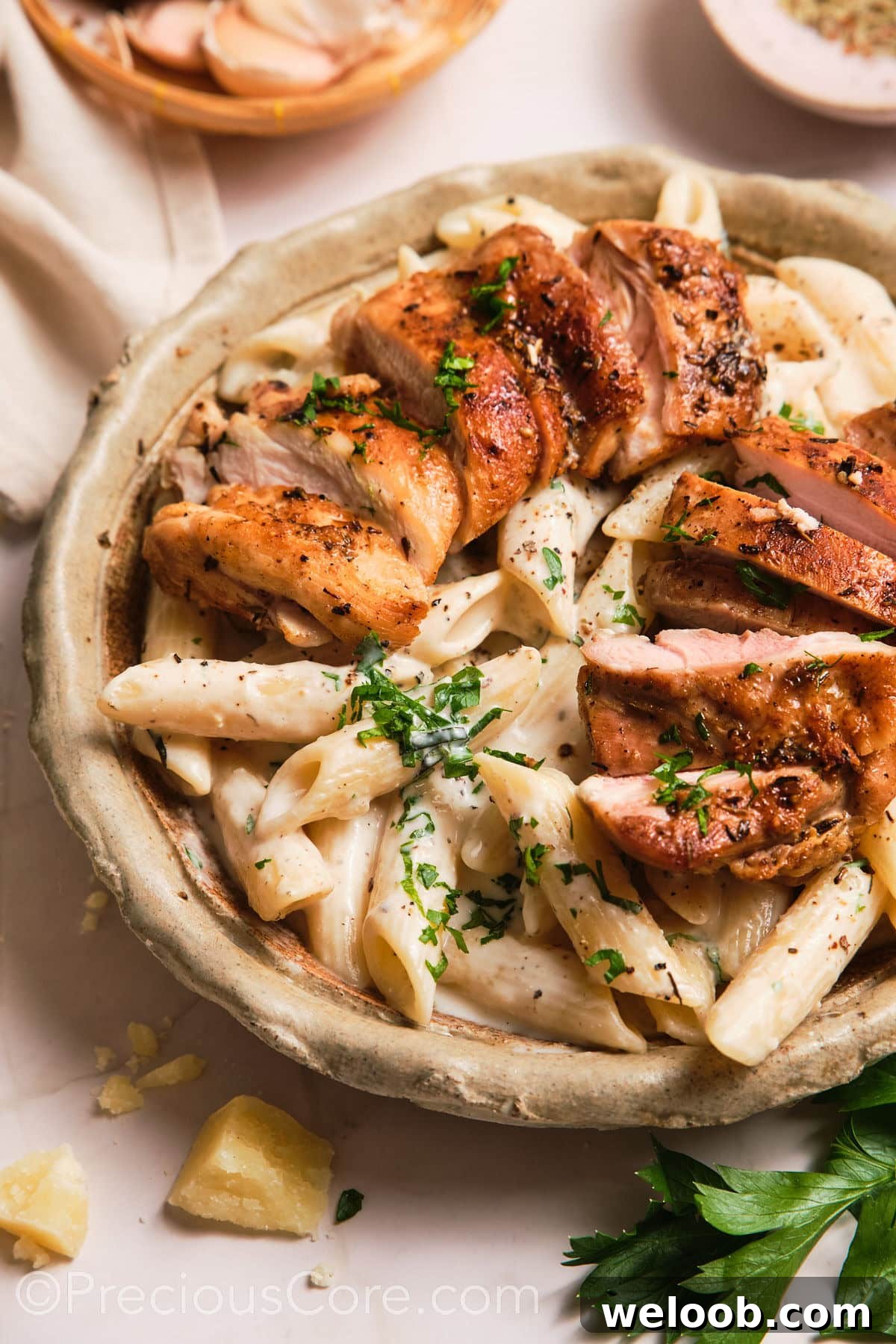 Close-up shot of a bowl of creamy pasta.