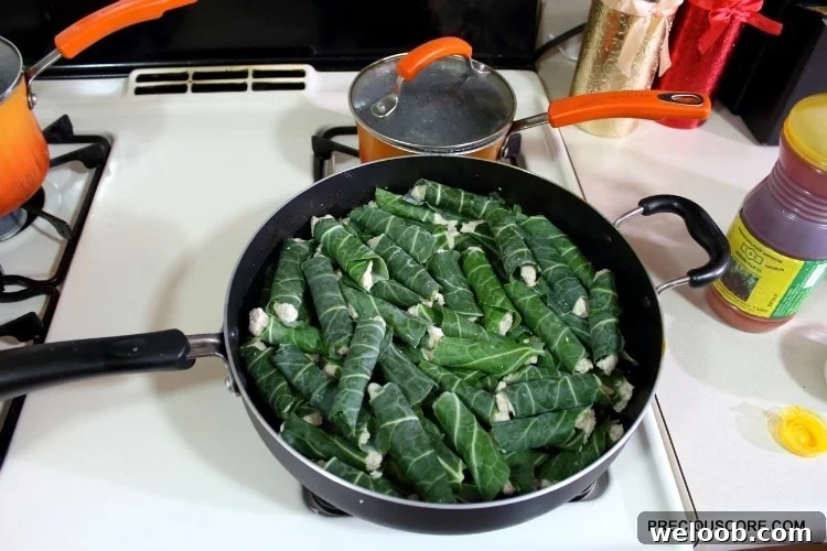 Cocoyam paste wrapped in leaves and in a skillet.
