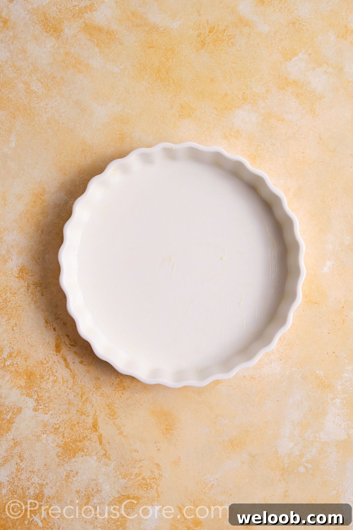 A greased pie dish.