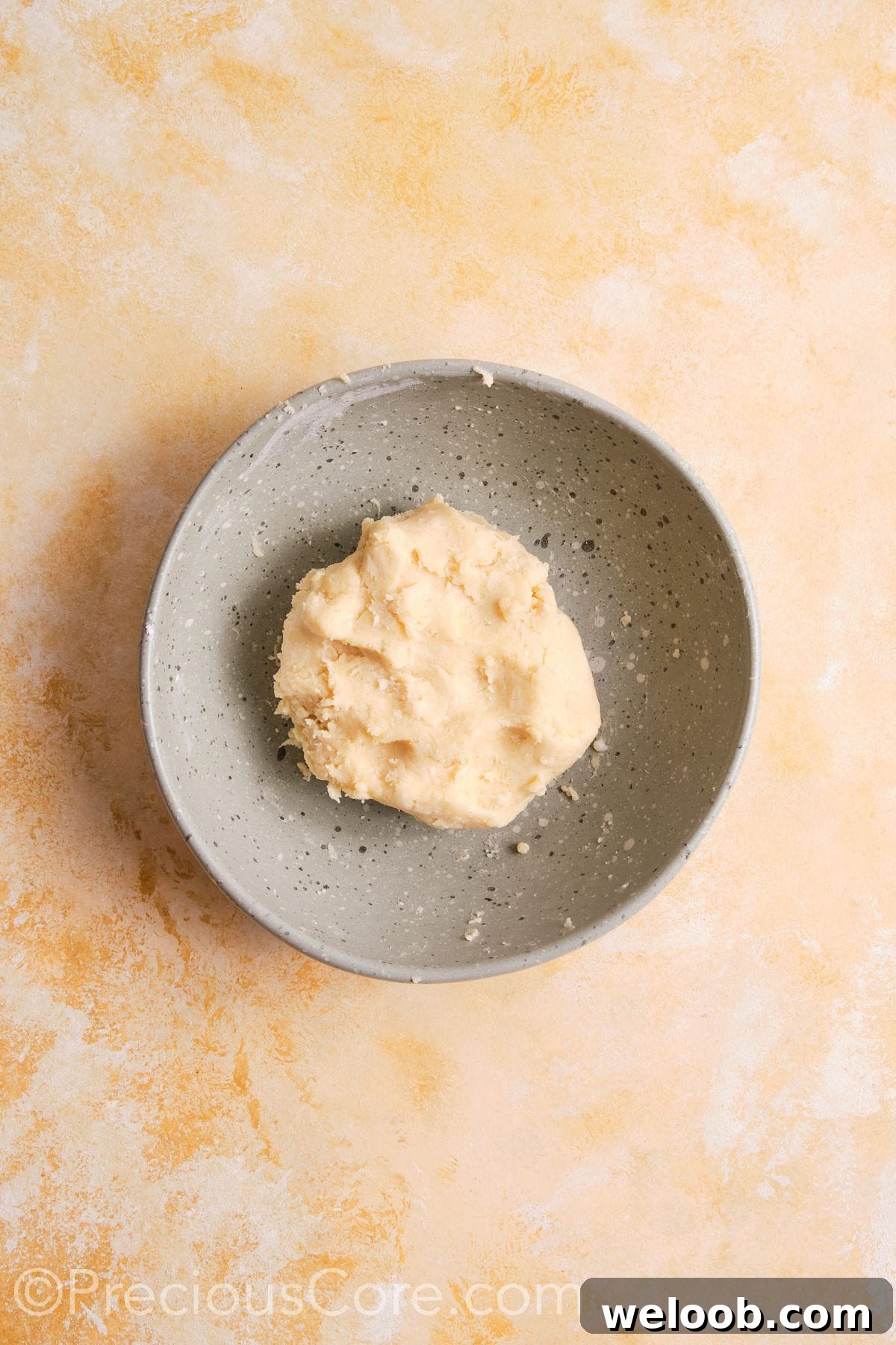Pie crust dough coming together.
