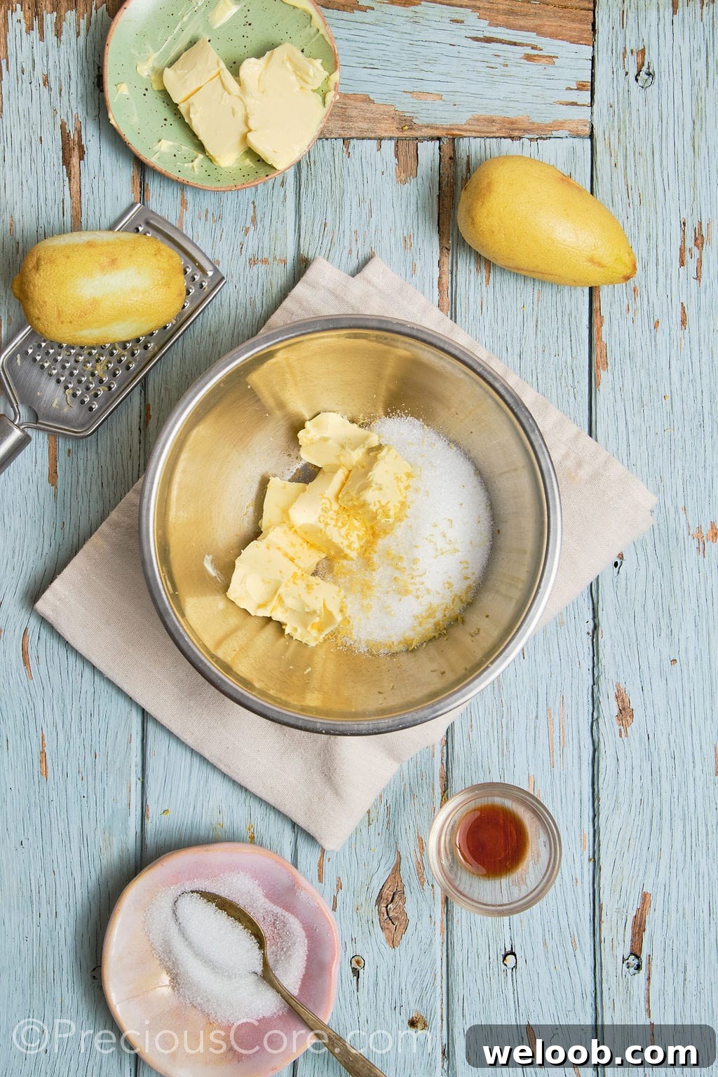 butter, sugar and lemon zest in a mixing bowl.