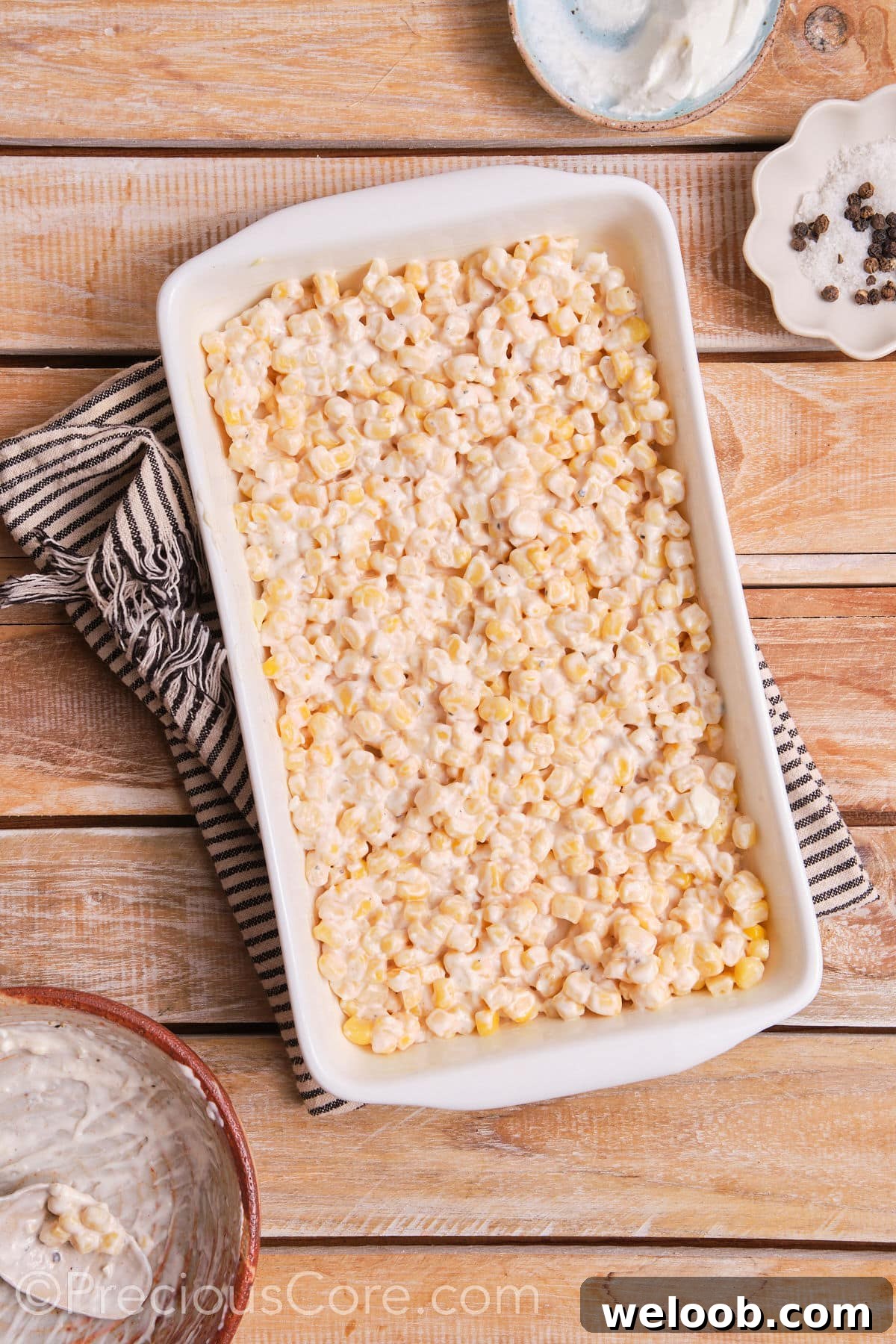 Creamy corn in a baking dish.