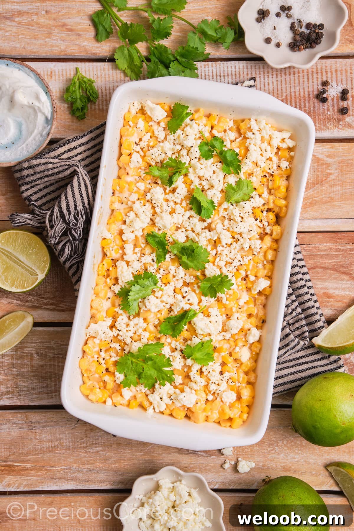 Baked street corn casserole garnished with fresh cilantro.