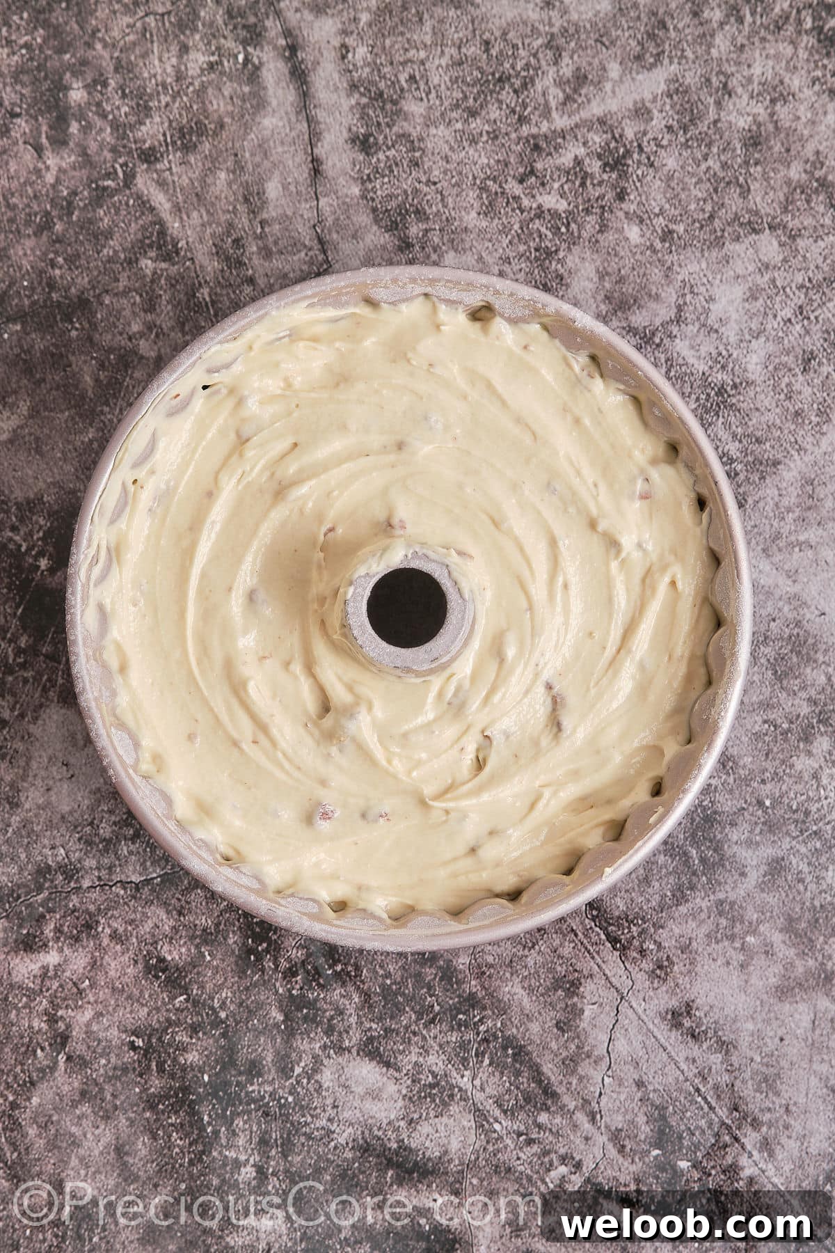 pour the batter into the prepared Bundt pan