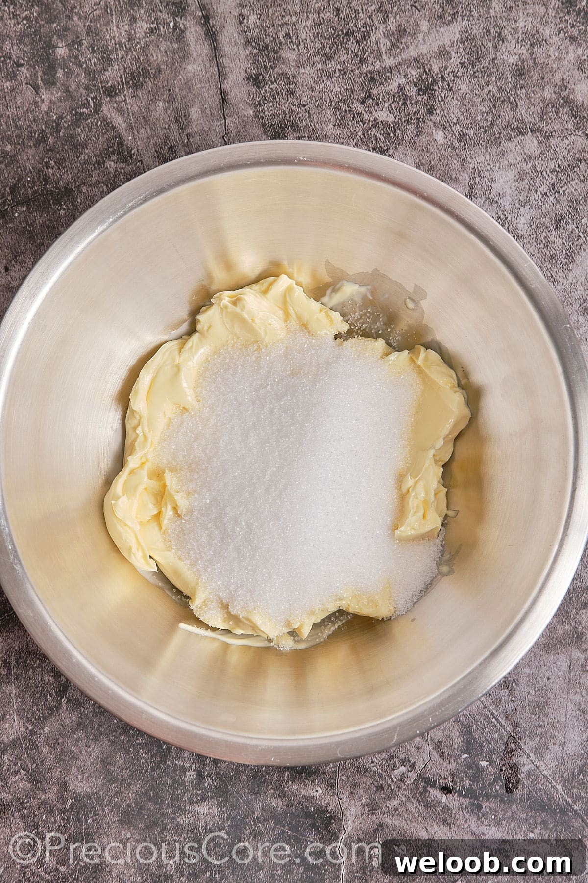 Cream butter and sugar in a huge vessel