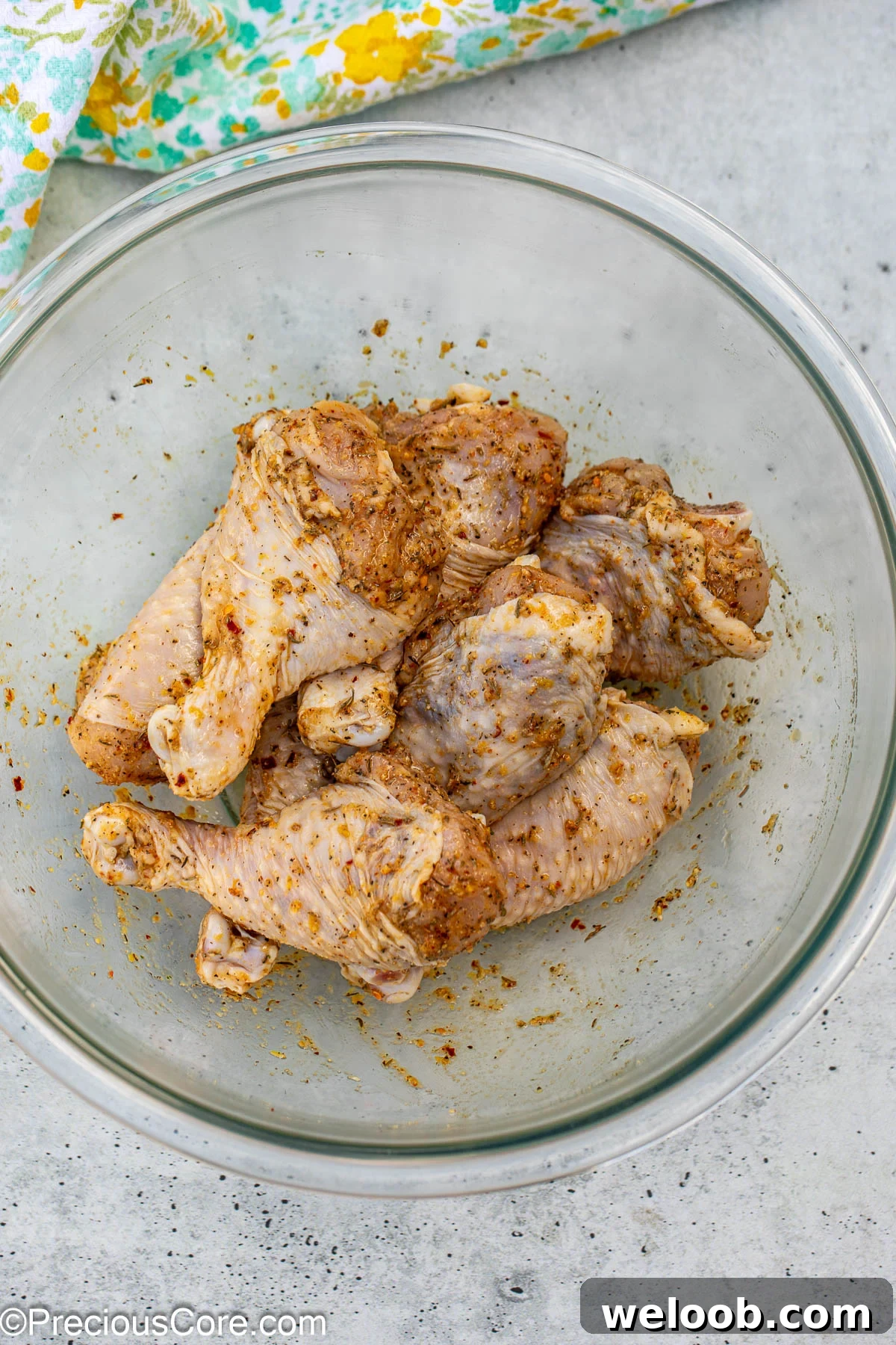 Seasoning rubbed all over chicken.