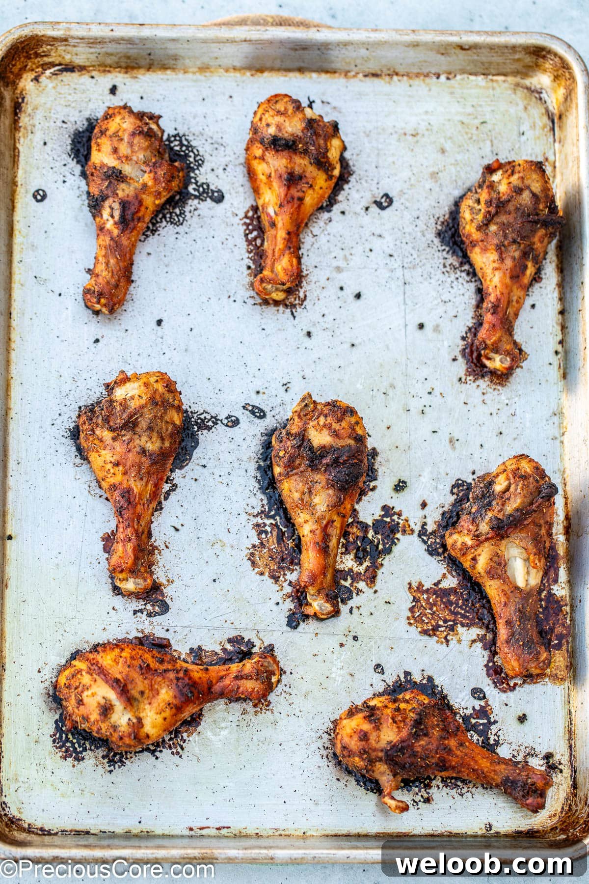 Crispy baked lemon pepper chicken drumsticks.
