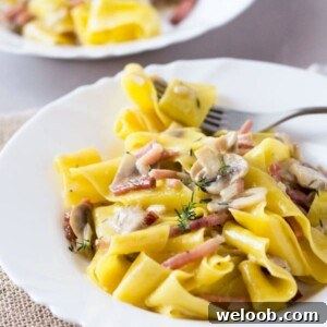 A delicious speck and mushroom pappardelle pasta made with a simple and incredibly delicious creamy sauce. www.insidetherustickitchen.com