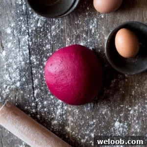 An easy beetroot pasta recipe. Learn how to make this simple beet pasta, it's fun, vibrant, bright pink and delicious. Authentic Italian recipes at Inside the rustic kitchen