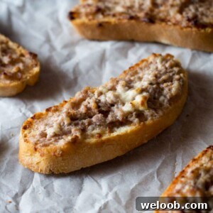 Stracchino and sausage crostini