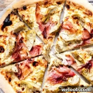 A close up of an artichoke pizza