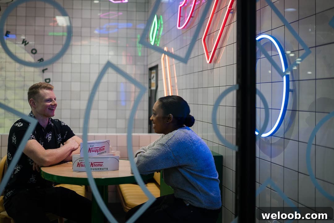 Man and woman sitting in store