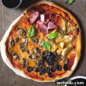 An overhead shot of a four seasons pizza