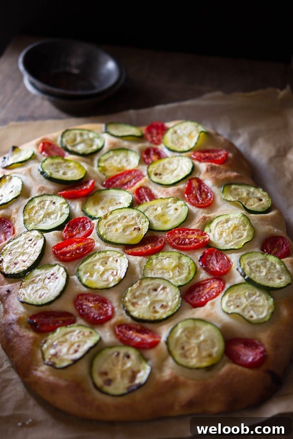 zucchini tomato focaccia inside the rustic kitchen