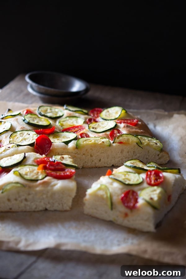 zucchini tomato focaccia inside the rustic kitchen
