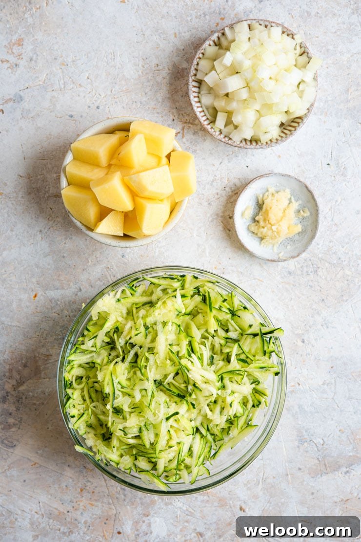 Ingredients prepped, cut and diced for making creamy zucchini soup