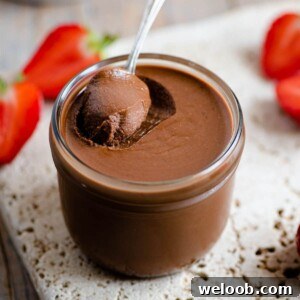 A square image of homemade nutella in a jar