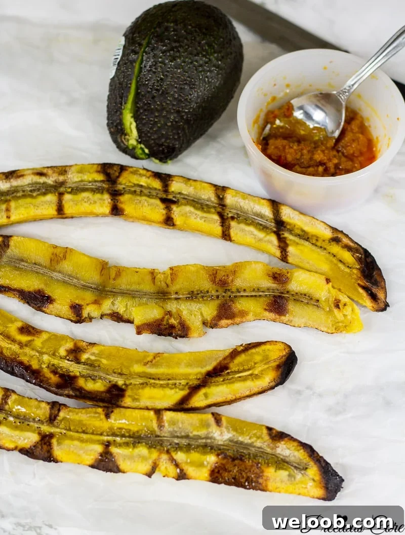 Halved plantains with grill marks.