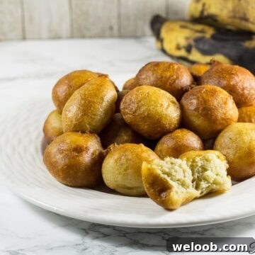 Plantain puff puffs on a white plate.