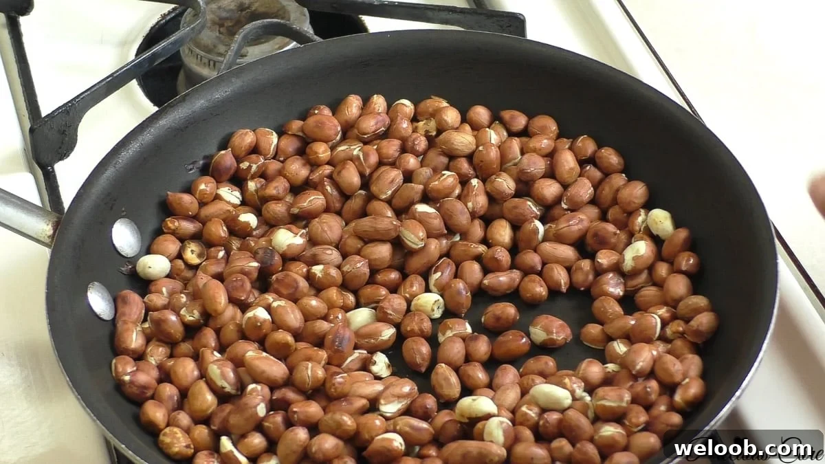 Making cameroon groundnut sweet roasted peanuts