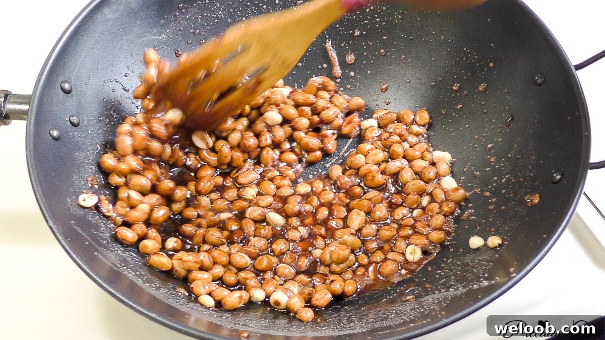 Making cameroon groundnut sweet sugar coated peanuts