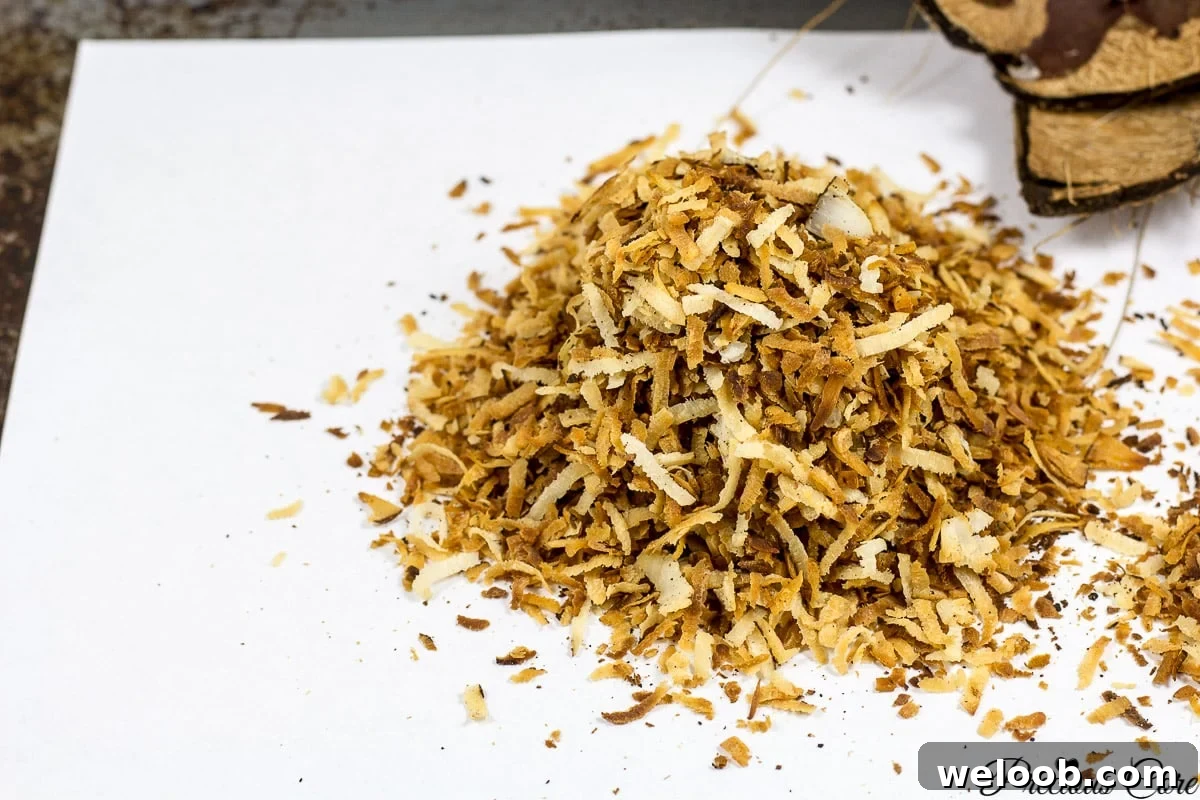 Toasted coconut flakes on paper.