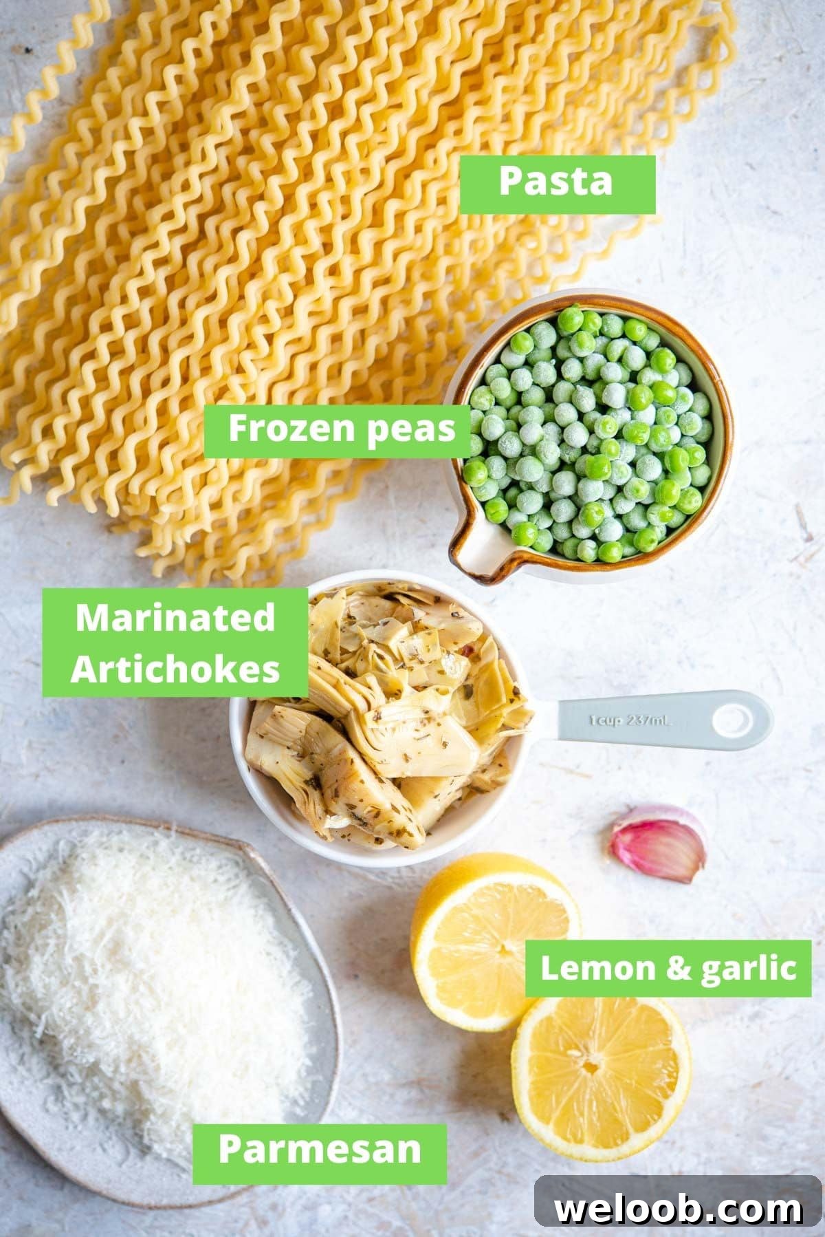 An overhead shot of ingredients for making artichoke pasta