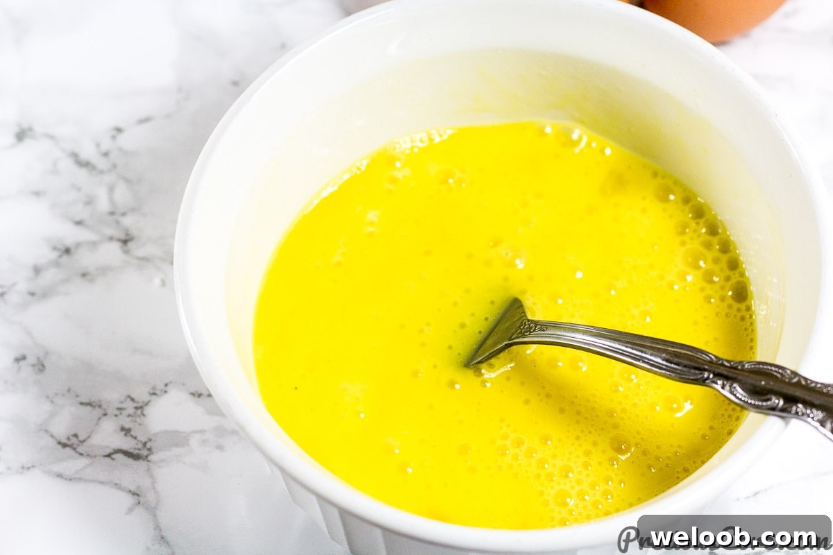 Step 2 for how to make an omelet with cheese