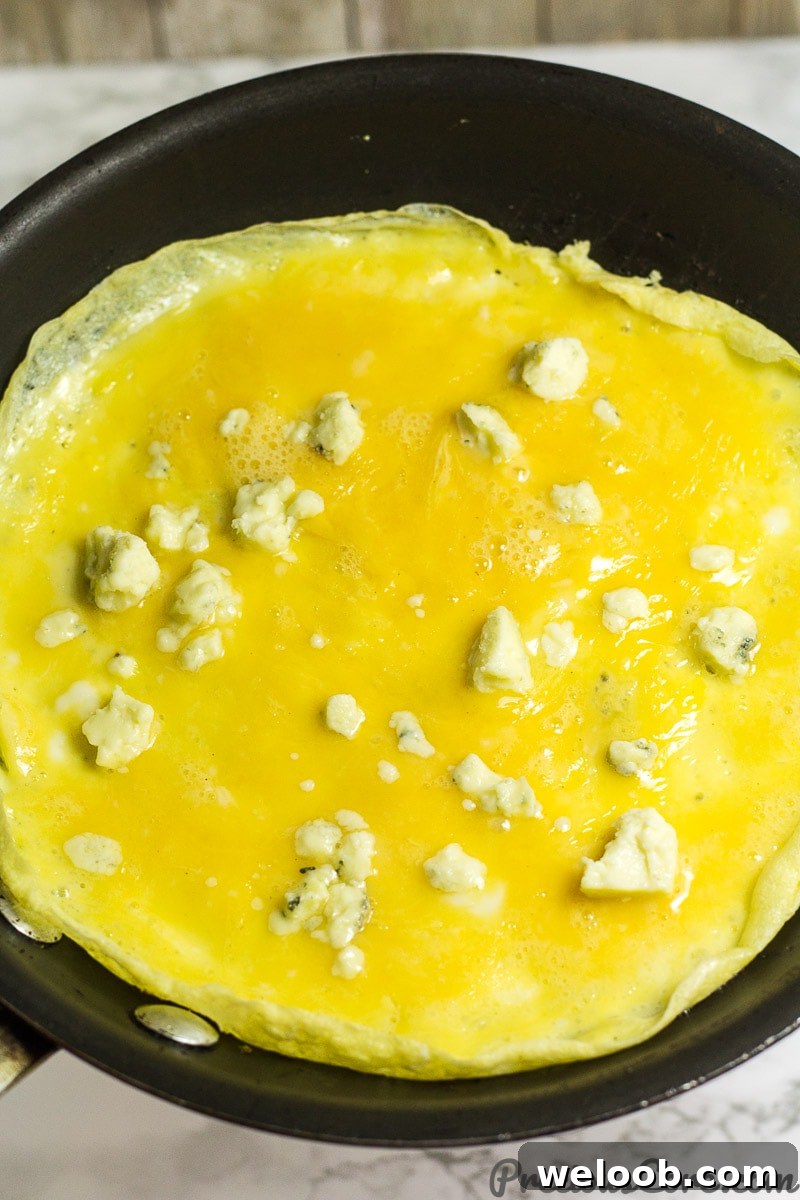How to make an omelet with cheese - step 3