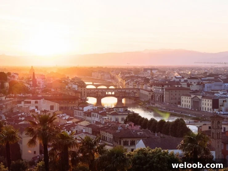A photo of the city of Florence and the Ponte Vecchio at sunset